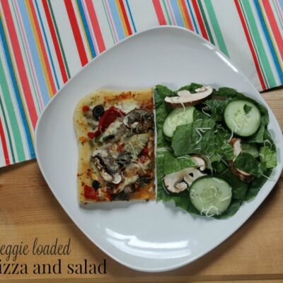 veggie loaded pizza and salad