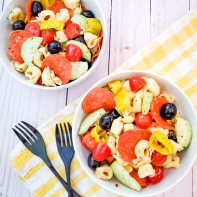 This delicious summer tortellini salad is a perfect side dish to go with your grilled foods. It's a favorite at pot lucks and is super easy to make!