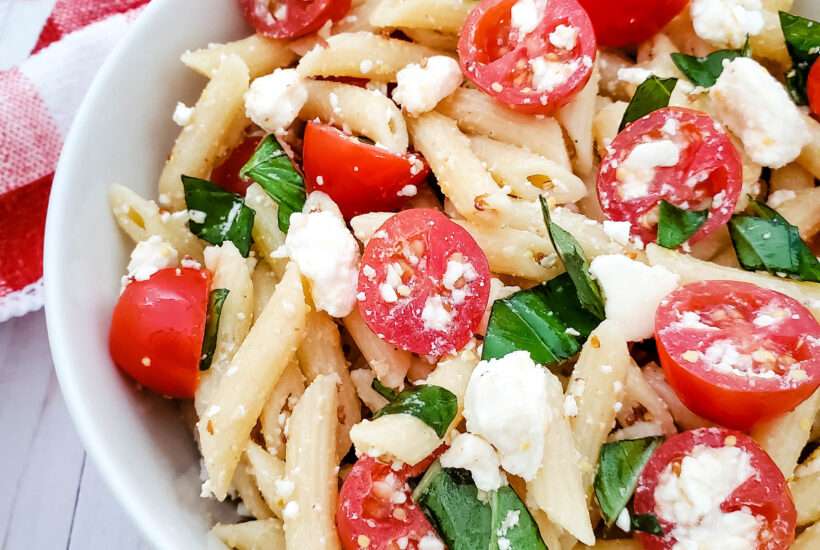 This tomato feta pasta salad is a delicious summer salad recipe, and super easy to make for a side dish or pot luck.