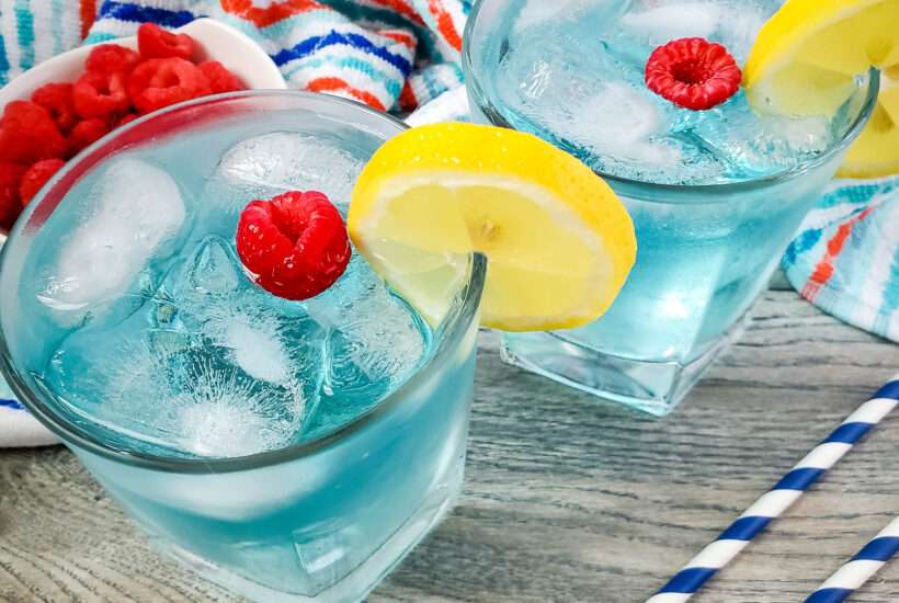 This blue island drink is one of my favorite cocktail recipes, and is super easy to make. This vodka and coconut rum cocktail is perfect for a hot summer day!
