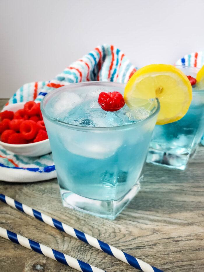 This blue island drink is one of my favorite cocktail recipes, and is super easy to make. This vodka and coconut rum cocktail is perfect for a hot summer day!