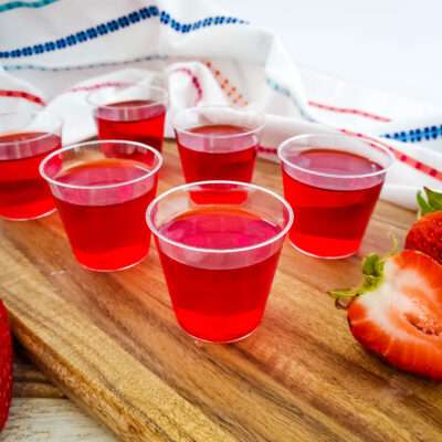 These strawberry green apple jello shots are my favorite jello shots recipe ever! The flavor combination is like no other, and they are just super simple to make!
