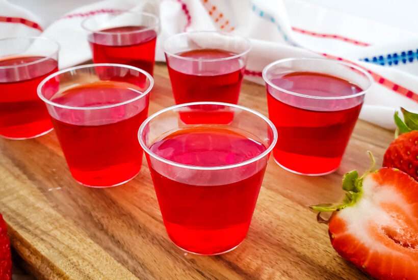 These strawberry green apple jello shots are my favorite jello shots recipe ever! The flavor combination is like no other, and they are just super simple to make!
