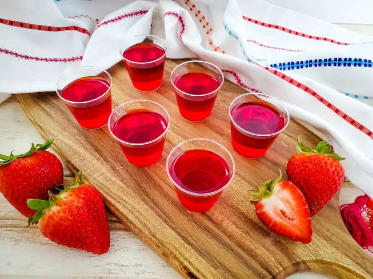 These strawberry green apple jello shots are my favorite jello shots recipe ever! The flavor combination is like no other, and they are just super simple to make!