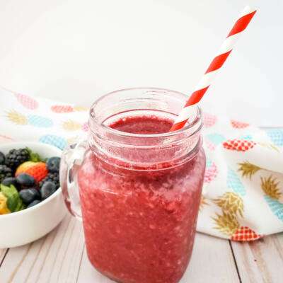 berry margarita recipe in mason jar glass