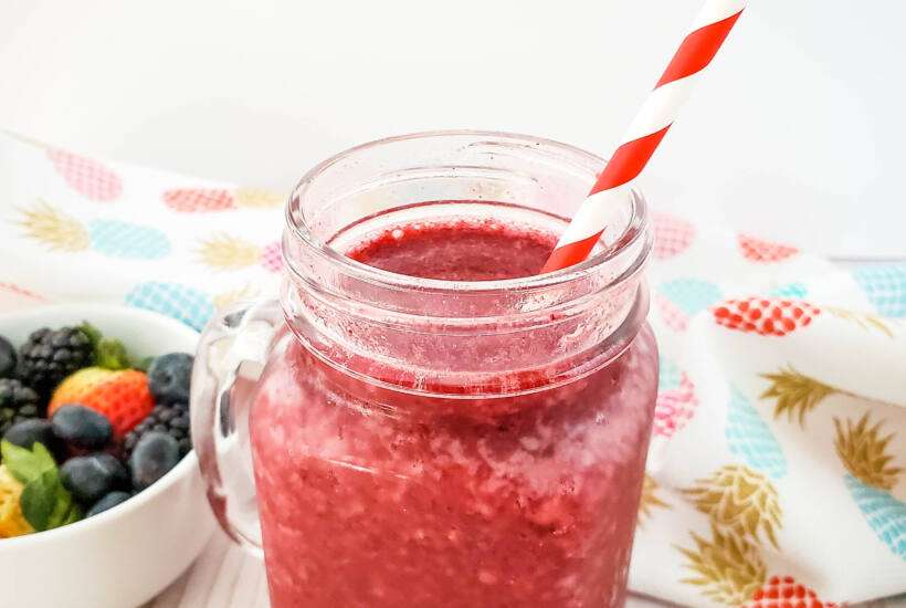 berry margarita recipe in mason jar glass
