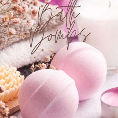 bath bombs with candle, and towels