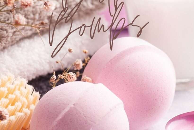 bath bombs with candle, and towels