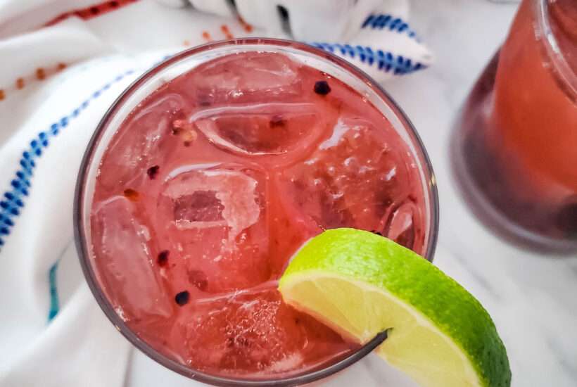 Blackberry Whiskey Lemonade with colorful towel
