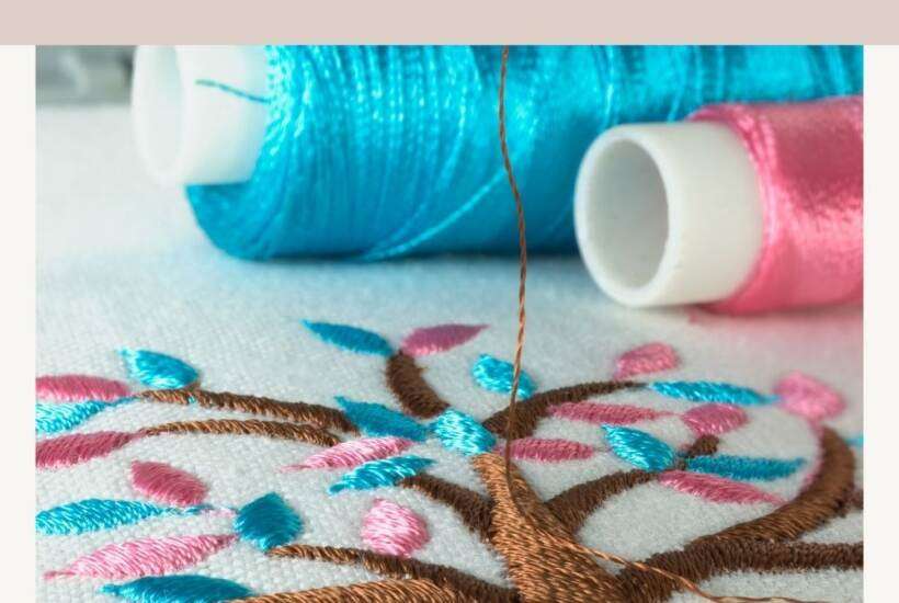 embroidering a tree with thread