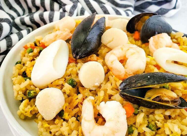 seafood on a plate of rice