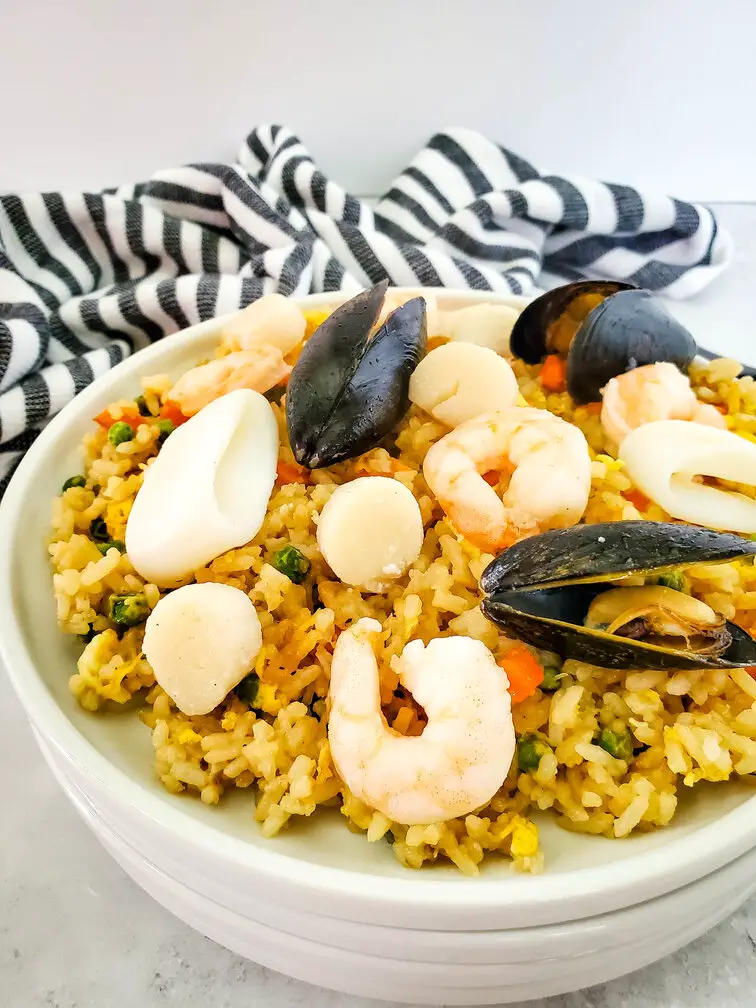 seafood on a plate of rice