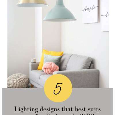 lighting designs over a couch with pillows