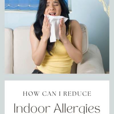 Reduce Indoor Allergies - woman sneezing