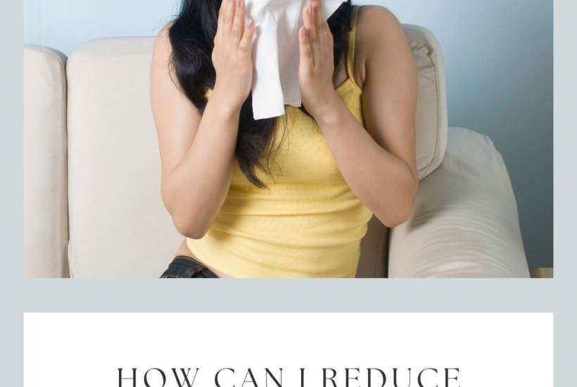 Reduce Indoor Allergies - woman sneezing