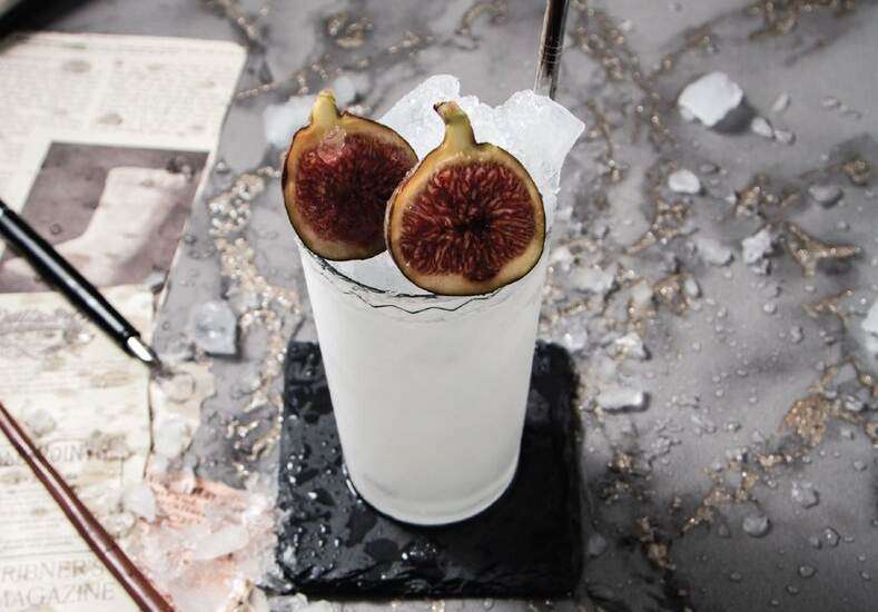 Euphoric Fig Elixer on dark background