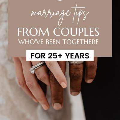 two hands with wedding rings