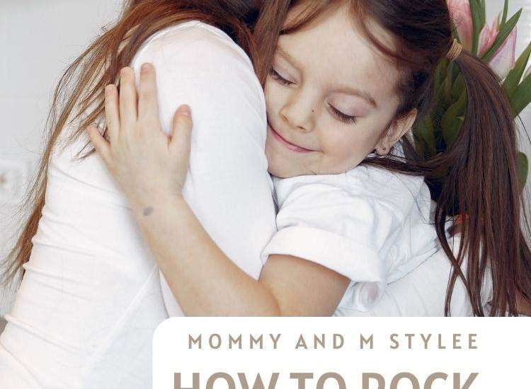 mother and daughter hugging in white tshirts
