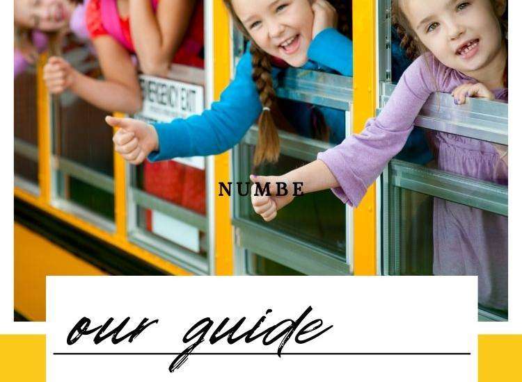 kids in bus hanging out the window