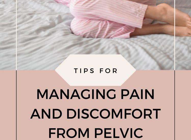 person in pink pajamas lying on bed holding abdomen