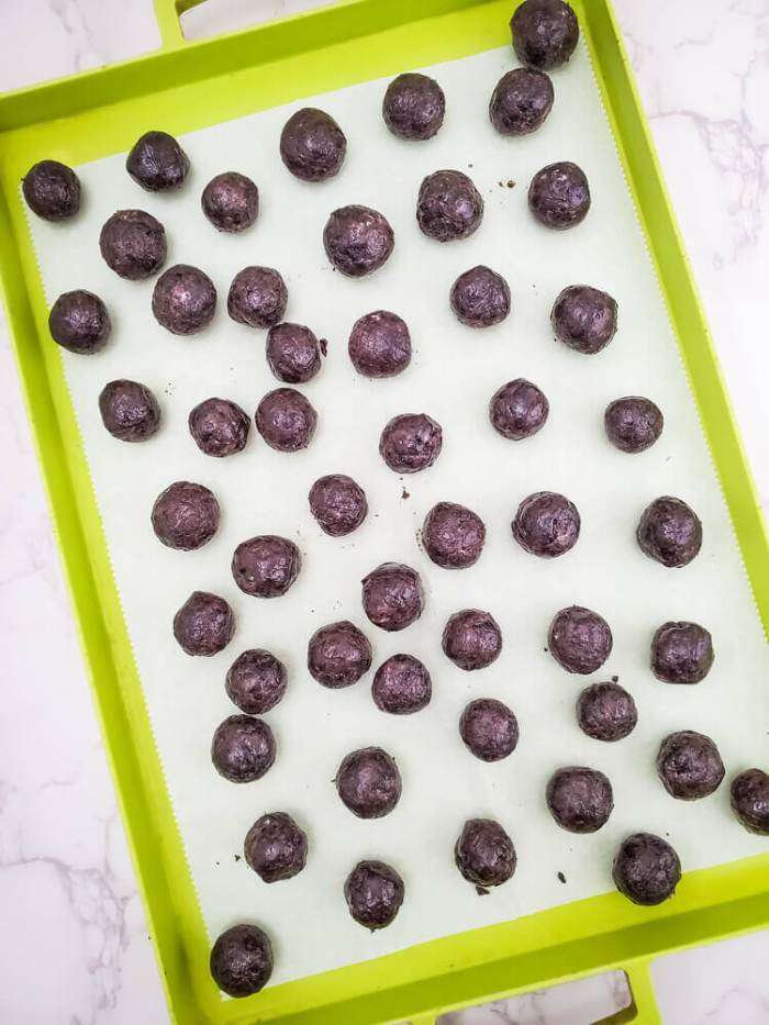 a baking tray of truffle balls