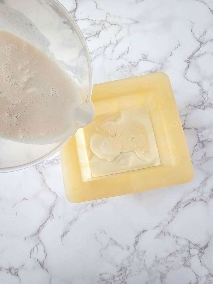 adding the second of soap to the mold