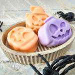 Jack O Lantern Vanilla Apple Soap Bars in a basket with spiders