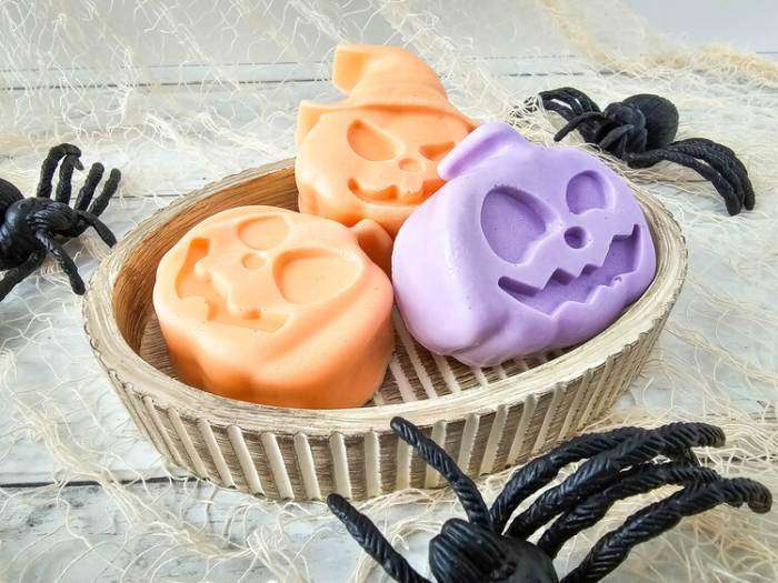 Jack O Lantern Vanilla Apple Soap Bars in a basket with spiders