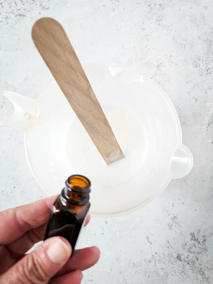 adding essential oils to the soap base