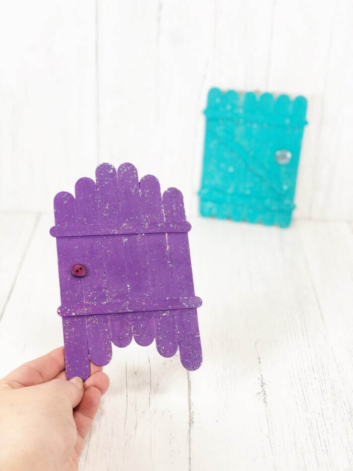 diy fairy doors in 2 designs, one in someone's hand