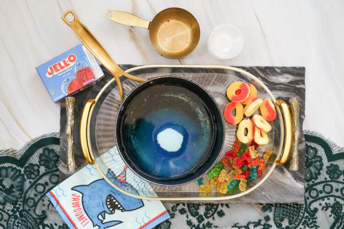 mixing the blue jello