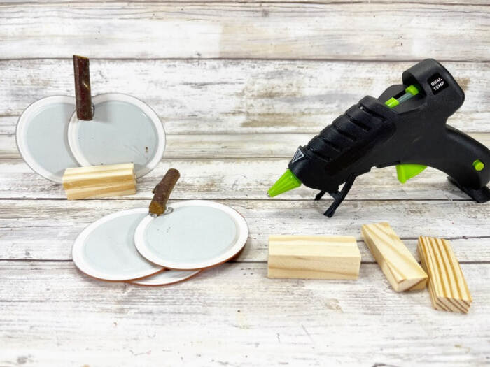 adding wooden pieces to help it stand