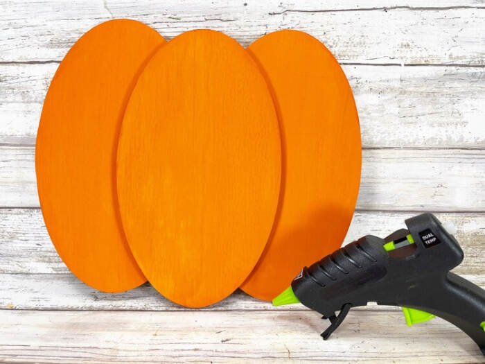 glueing the lighter pumpkin pieces together
