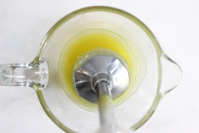 mixing the oil into a whip