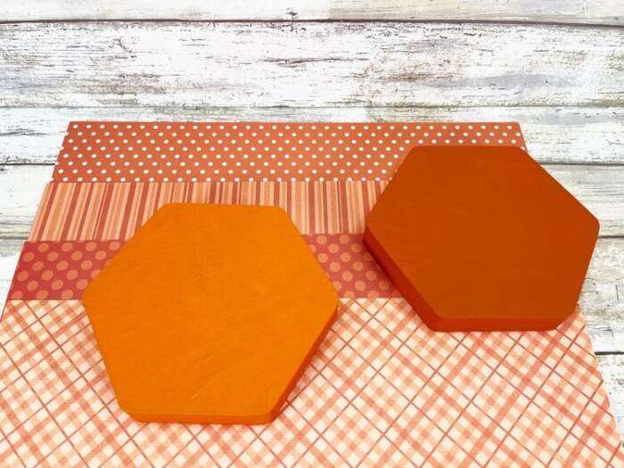paint the wooden pieces orange to match the paper