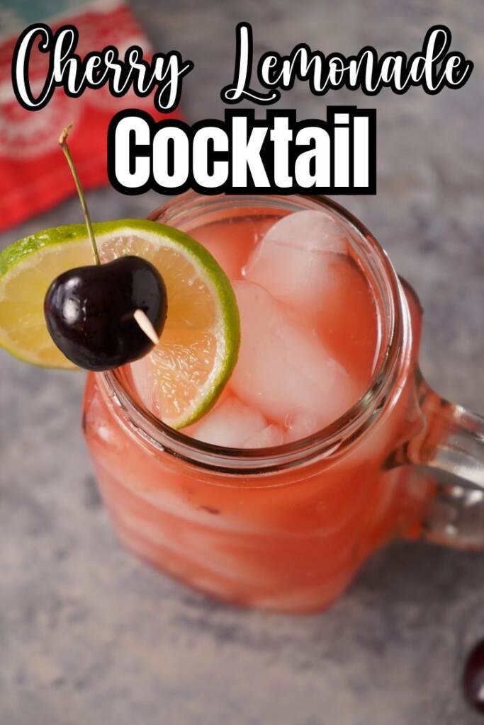 cherry lemonade cocktail in mason jar glass with lime and cherry garnish - text: cherry lemonade coktail