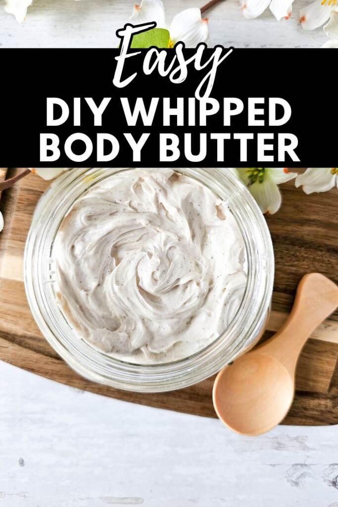 whipped body butter in jar on wood block