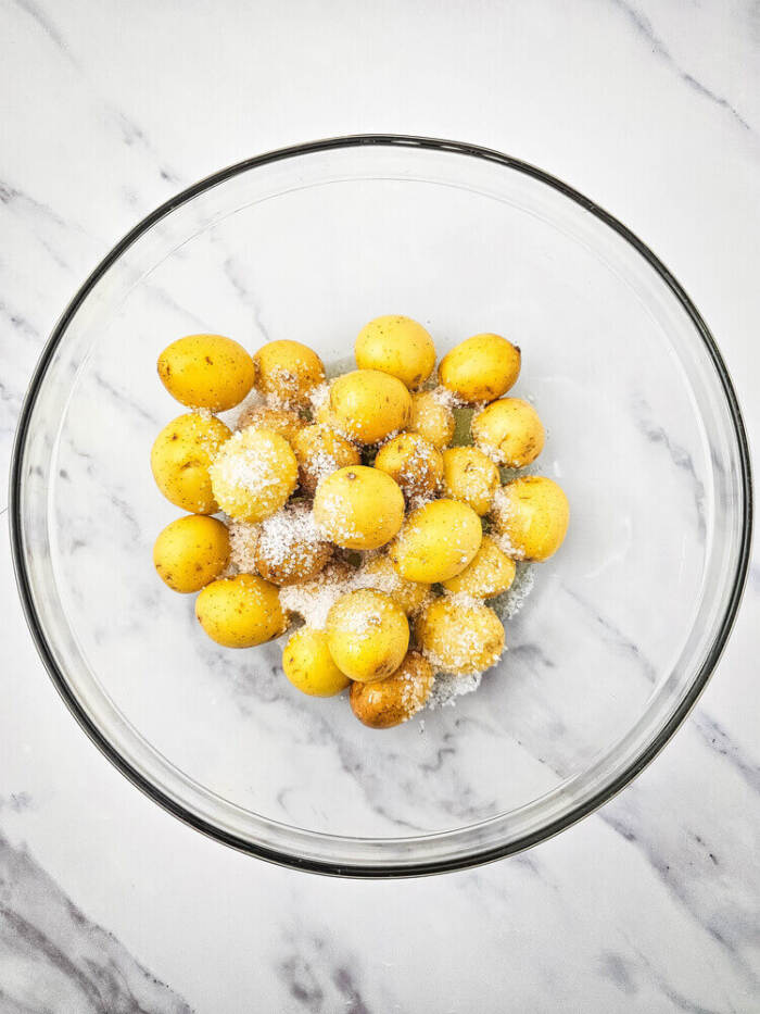 potatoes covered in oil and salt