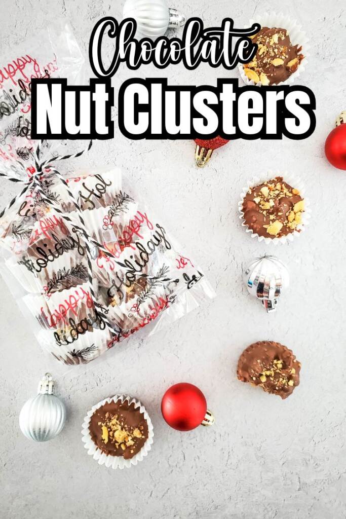 test: chocolate nut clusters - homemade candy on grey table with ornaments and a treat bag