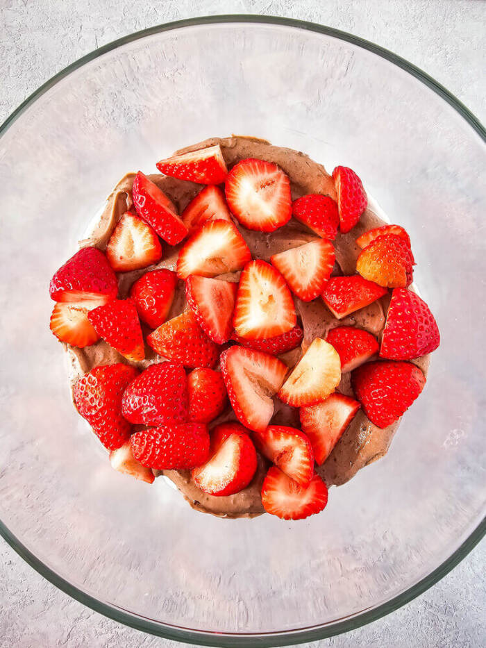 adding the strawberries