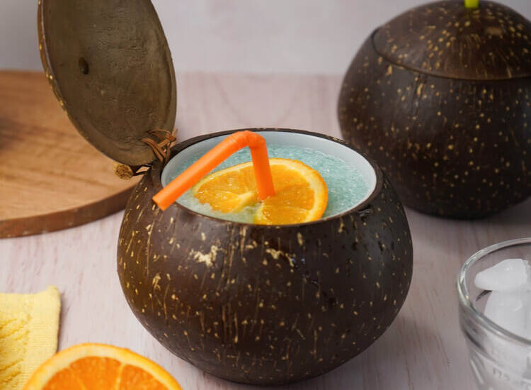 Frozen Blue Cocktails with Vodka in a coconut cup