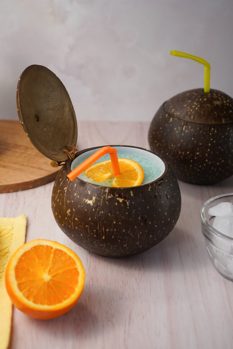Frozen Blue Cocktails with Vodka in a coconut cup