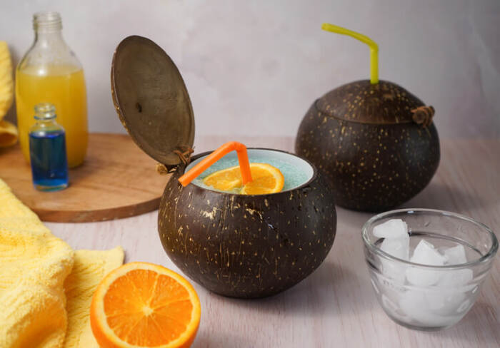 Frozen Blue Cocktails with Vodka in a coconut cup