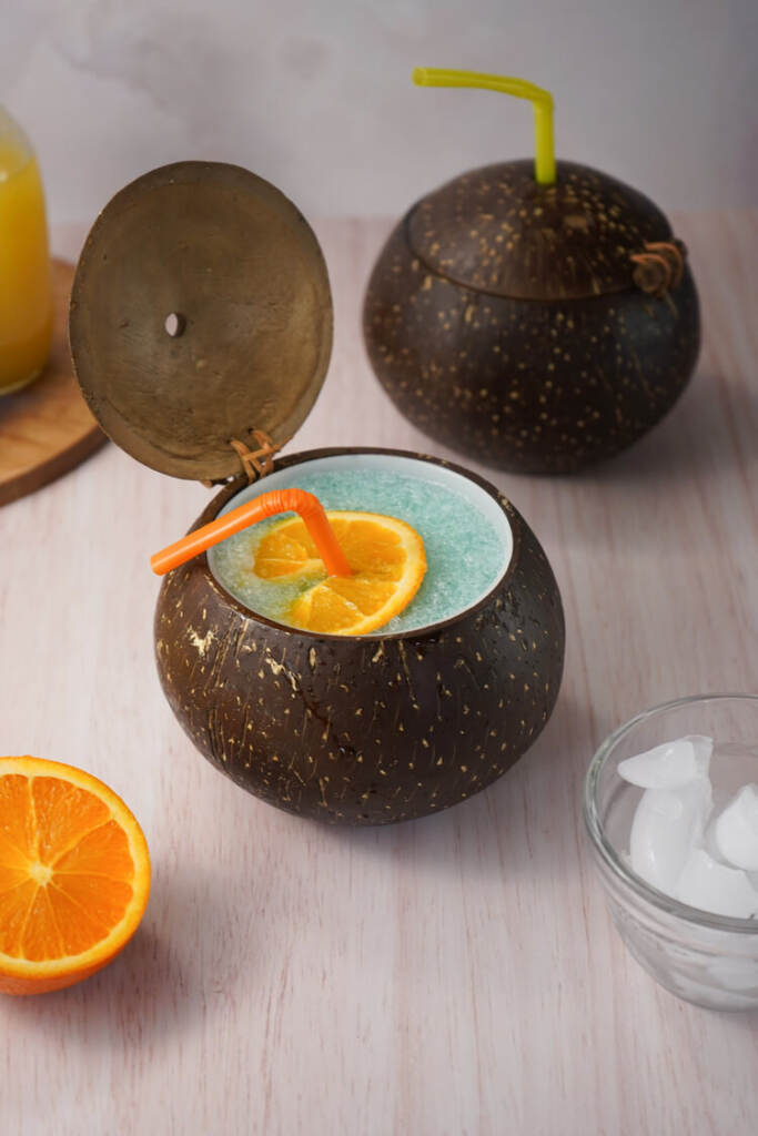 Frozen Blue Cocktails with Vodka in a coconut cup