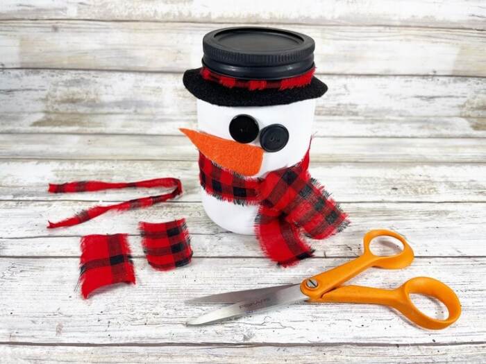 glue the scarf on the snowman