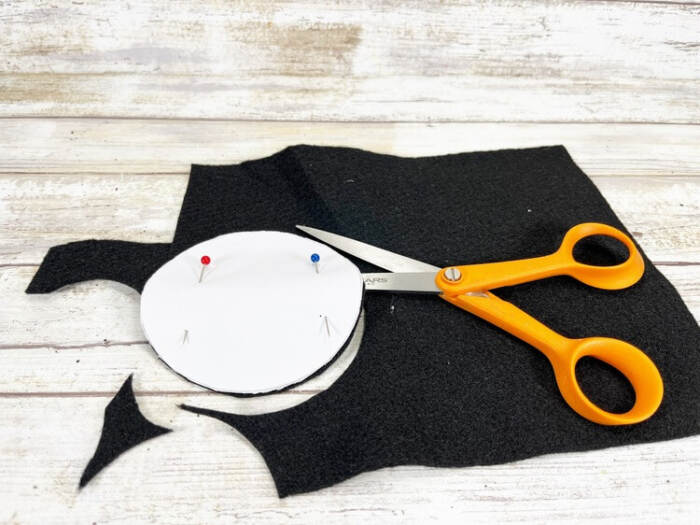 a white circle pattern on the black felt