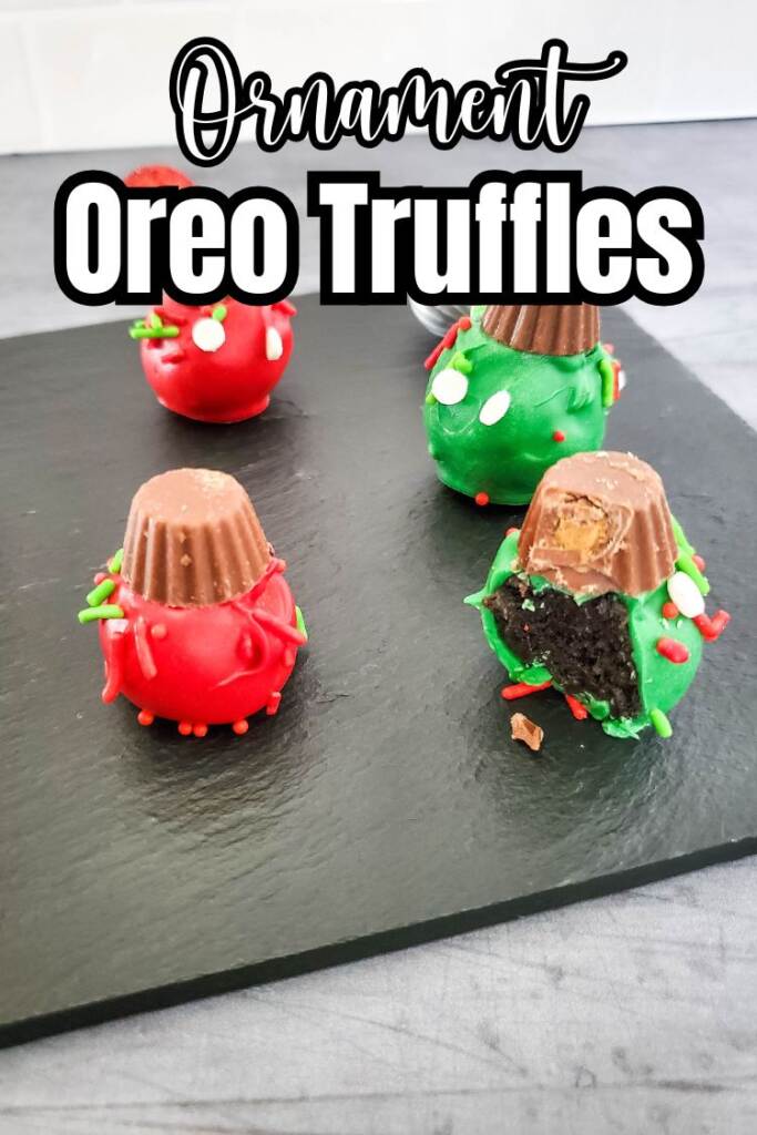 text: oreo christmas ornaments on black slate board
