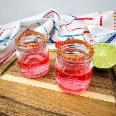 Watermelon Shot glasses on a brown table