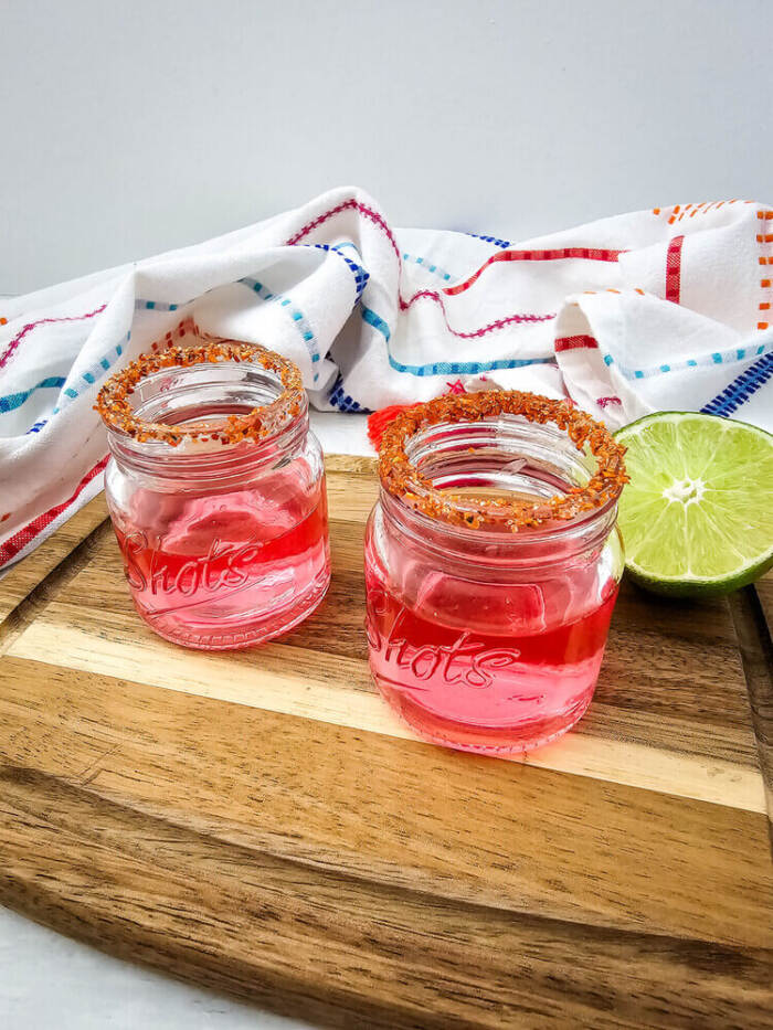 Watermelon Shot glasses on a brown table