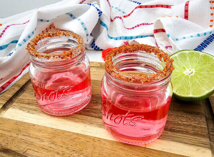 Watermelon Shot glasses on a brown table